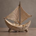 VELMIRN® stone sailboat sculpture — full product view, clean neutral background, linen sail wooden mast glass orb in travertine hull